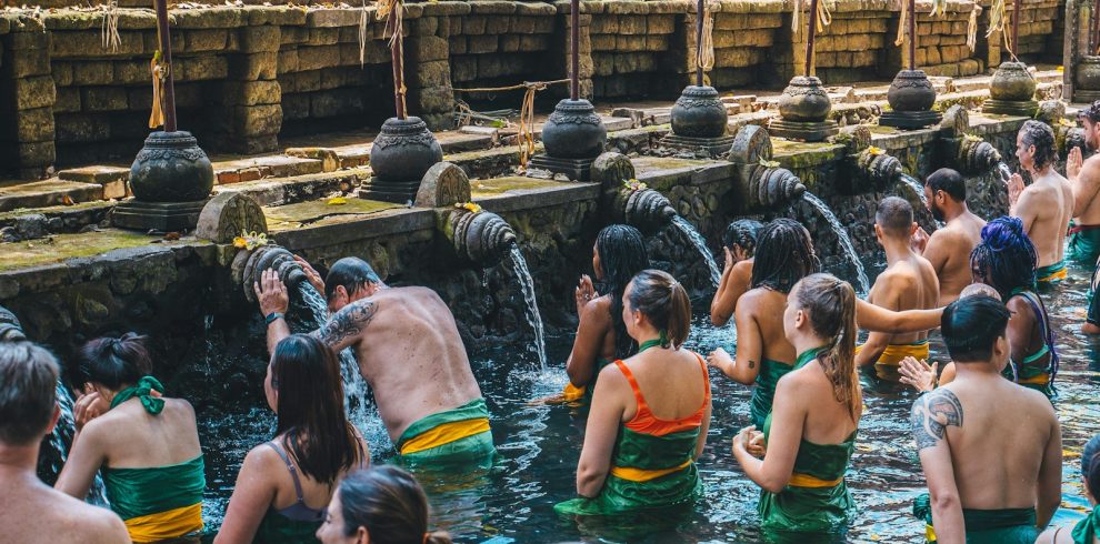 a group of people in a body of water